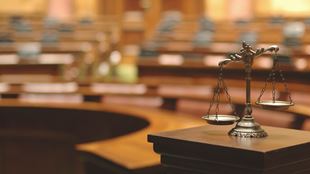 scales in a room of justice