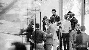 Diverse group of people discussing in the office