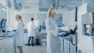 Team of researchers working in a lab