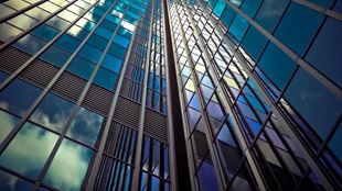 closeup of glass on tall building