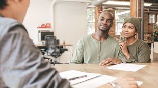 black couple in meeting