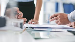 hands in meeting