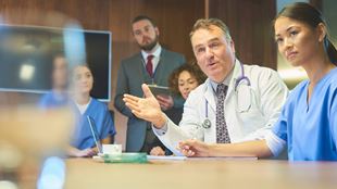 health professionals at meeting