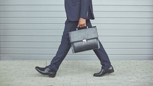 man walking with soft briefcase