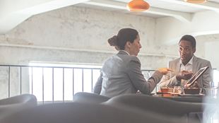 two people having a working lunch
