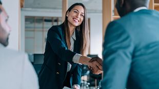 two person shaking hands